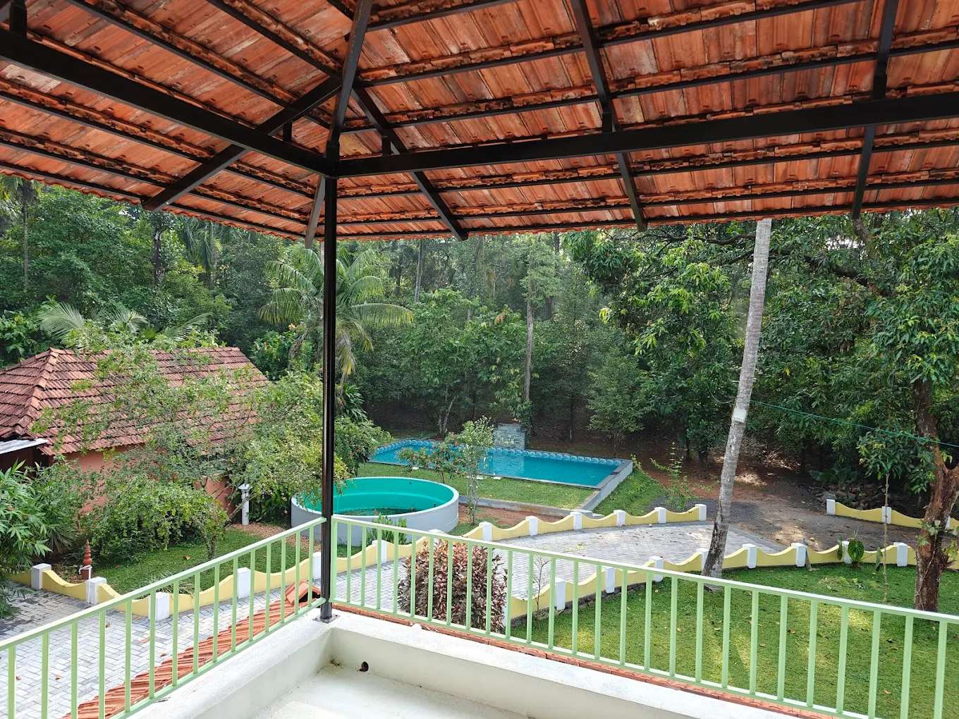 Homestay upper balcony showing greenery